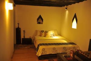 Letto o letti in una camera di Peacock Guest House