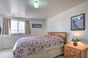 a bedroom with a bed and a window at Pet-Friendly Aurora House with Mountain Views! in Salina