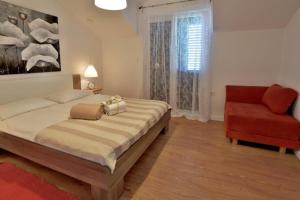 Ένα ή περισσότερα κρεβάτια σε δωμάτιο στο Apartments Wellness & Beauty +68 φωτογραφίες