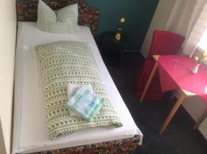 
Ein Bett oder Betten in einem Zimmer der Unterkunft Gasthof Stadt Brandenburg
