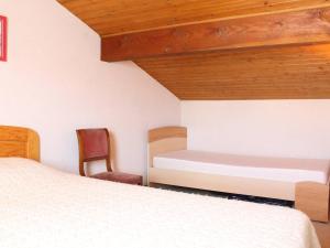 Posteľ alebo postele v izbe v ubytovaní Maison Dolus-d'Oléron, 2 pièces, 5 personnes - FR-1-246A-201