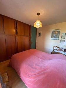 Łóżko lub łóżka w pokoju w obiekcie Maison 2 a 12 personnes,quartier résidentiel