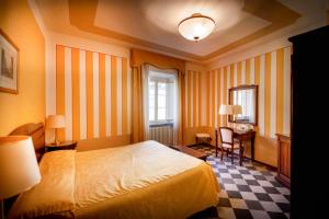 Postel nebo postele na pokoji v ubytování Park Hotel Regina - with air-condition and pool