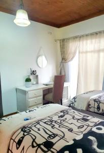 Postel nebo postele na pokoji v ubytování Horison Meyer Guest Suites