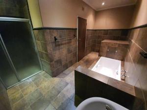 Koupelna v ubytování Horison Meyer Guest Suites
