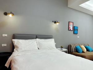 Postel nebo postele na pokoji v ubytování 游遊民宿 Yulazy inn 寵物友善 I 包棟