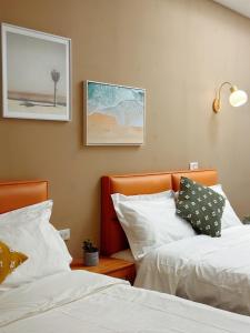 Postel nebo postele na pokoji v ubytování 游遊民宿 Yulazy inn 寵物友善 I 包棟