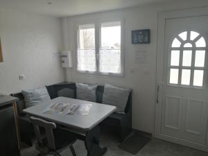 TV a/nebo společenská místnost v ubytování gite repos et tranquillité M