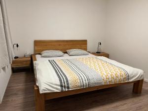Postel nebo postele na pokoji v ubytování Apartmány Josefáč se saunou