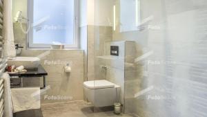 Um banheiro em Villa Westend Hotel an der Messe