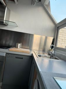 A kitchen or kitchenette at La casa di Angelina