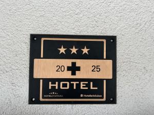 Certificato, attestato, insegna o altro documento esposto da Hotel Fassbind Beausite