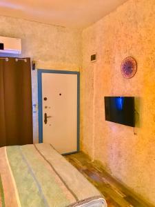 TV i/ili multimedijalni sistem u objektu Hotel Barba