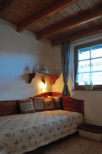 A bed or beds in a room at Aquapark Tatralandia chatka 118