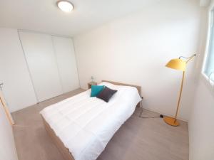 Posteľ alebo postele v izbe v ubytovaní Apparteo Perpignan