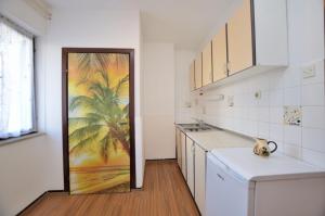Kuchyň nebo kuchyňský kout v ubytování Apartments Ljiljana