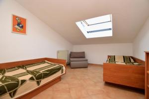Postel nebo postele na pokoji v ubytování Apartments Ljiljana