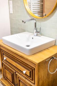 Kúpeľňa v ubytovaní Le 05-GregIMMO-Appart'Hôtel