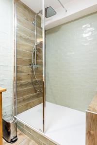 Kúpeľňa v ubytovaní Le 05-GregIMMO-Appart'Hôtel