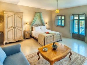 A bed or beds in a room at Haones Suites