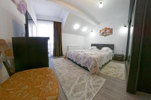 Postel nebo postele na pokoji v ubytování Casa de pe Deal