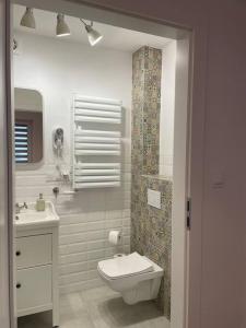 Ένα μπάνιο στο A.S.Apartament A Okrzei 4