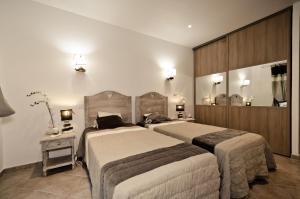 Posteľ alebo postele v izbe v ubytovaní Domaine Finili