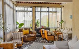 Posezení v ubytování Riad Mayfez Suites & Spa