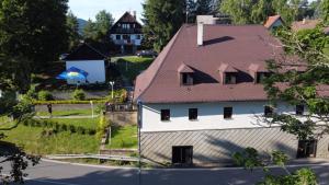 an aerial view of a house with a roof at Penzion Lenora in Lenora