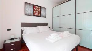 A bed or beds in a room at Italianway - Zuretti 32 Még 18 kép