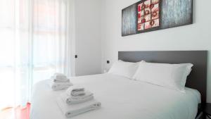 A bed or beds in a room at Italianway - Zuretti 32