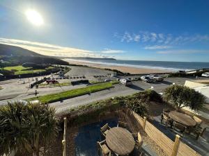 a view of a beach and the ocean at Southover Beach in Woolacombe