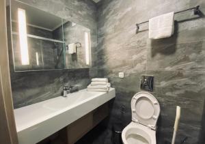 Koupelna v ubytování Apart-hotel Ye,s Astana