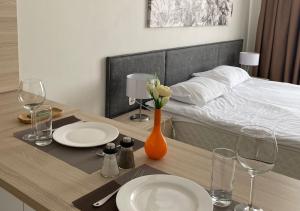 Postel nebo postele na pokoji v ubytování Apart-hotel Ye,s Astana