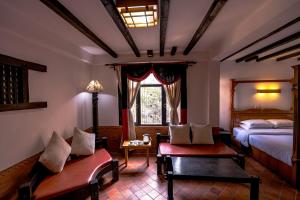 Een zitgedeelte bij Hotel Ganesh Himal