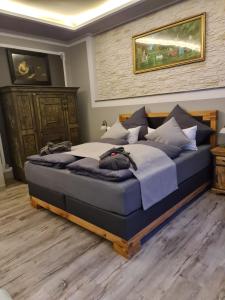 מיטה או מיטות בחדר ב-Apartment Alte Schusterei