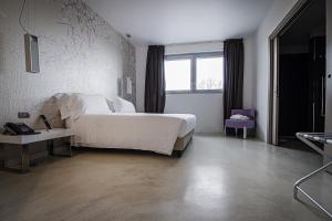 Voodi või voodid majutusasutuse Hotel For You toas