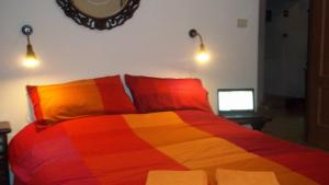 Ένα ή περισσότερα κρεβάτια σε δωμάτιο στο Il Pretoriano