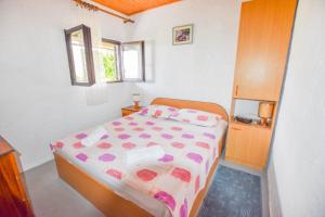 Postel nebo postele na pokoji v ubytování House Mandica