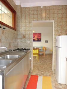 A kitchen or kitchenette at Adorable Villa for 8 people close to the sea