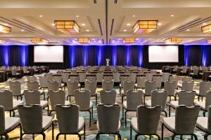 a large room with rows of chairs and screens at Hyatt Regency San Antonio Riverwalk in San Antonio
