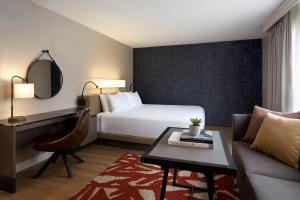 Postel nebo postele na pokoji v ubytování Hyatt Regency San Antonio Riverwalk