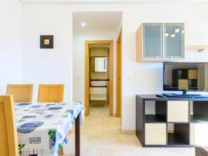 A bed or beds in a room at Apartment Jardin by Interhome
