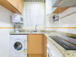 A kitchen or kitchenette at Apartment Jardin by Interhome