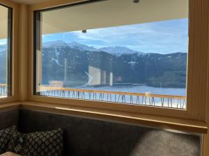 a window in a room with a view of a mountain at Apartment Martina by Interhome in Gattererberg