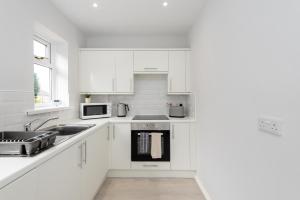 Η κουζίνα ή μικρή κουζίνα στο Cosy 2 bedroom house in Consett