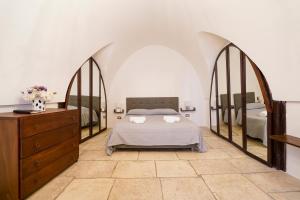 Giường trong phòng chung tại A Casa da Claudia Home with Netflix