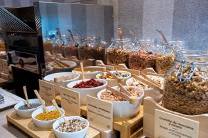 a display of different types of cereals in bowls at Catalonia Conde de Floridablanca in Murcia