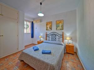 Postel nebo postele na pokoji v ubytování Apartment Canuta Baja-1 by Interhome