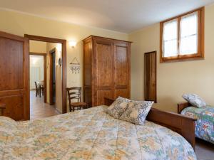 A bed or beds in a room at Apartment Daniele by Interhome